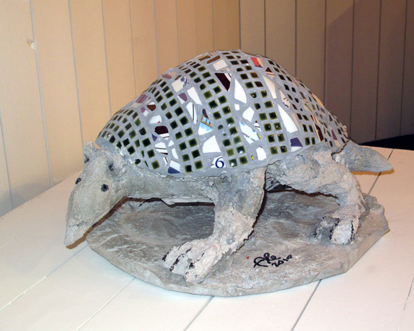 The protective shield. Sculpture, 2012. Concrete, mosaik, 35 cm. 